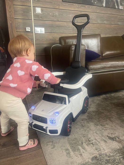 Машинка каталка детская