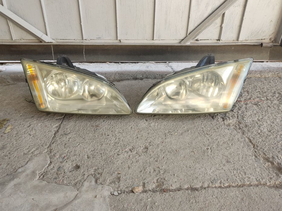 Фары ford focus ..