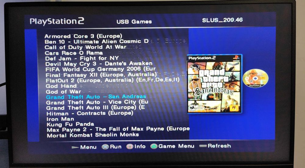 Playstation 2 cu 33 jocuri de top ,maneta ,cabluri