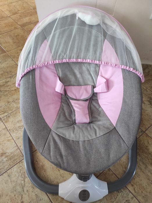 Balansoar electric pentru bebeluși