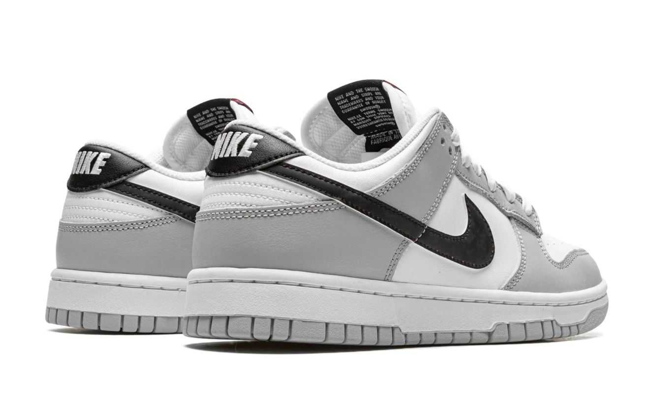 Nike dunk low retro se Lottery Grey