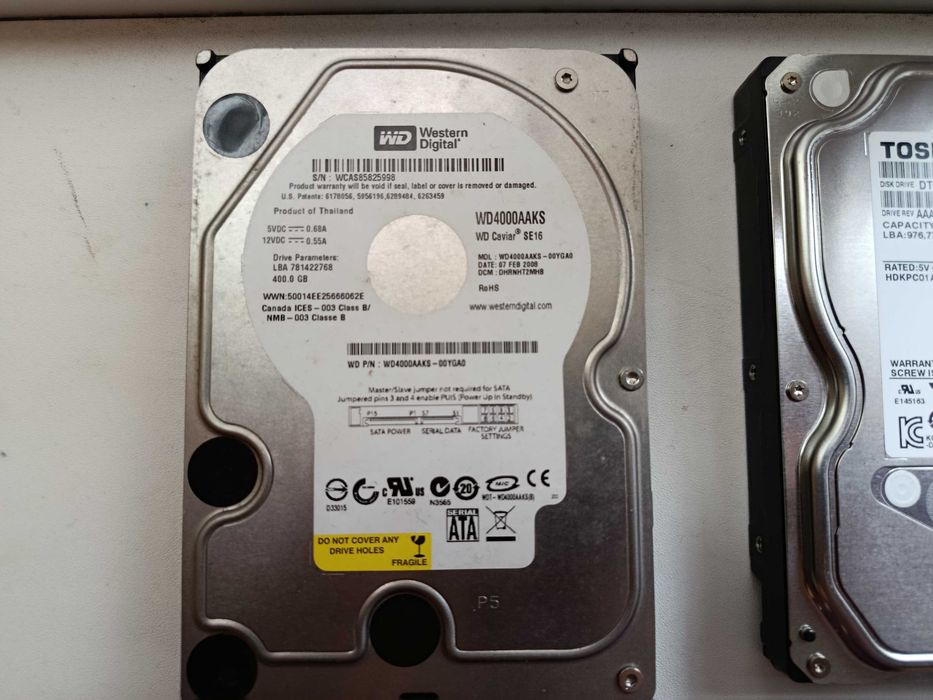 Vând 4 HDD-uri de la 400GB la 1TB WD, Hitachi si Seagate