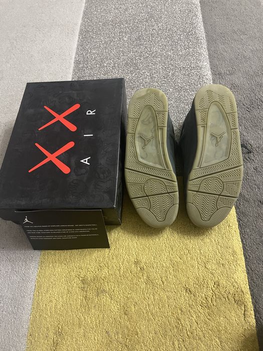 Jordan 4 Black Kaws