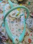 Babynest cu perinuta si arcada de jucarii
