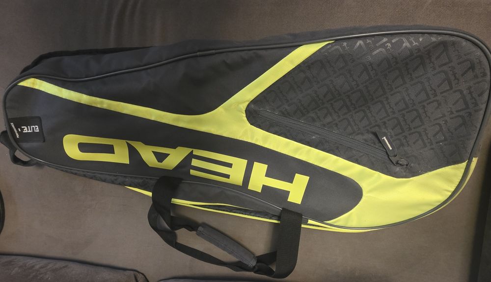 Racheta tenis+geanta -husa- folosite foarte putin,in stare foarte buna