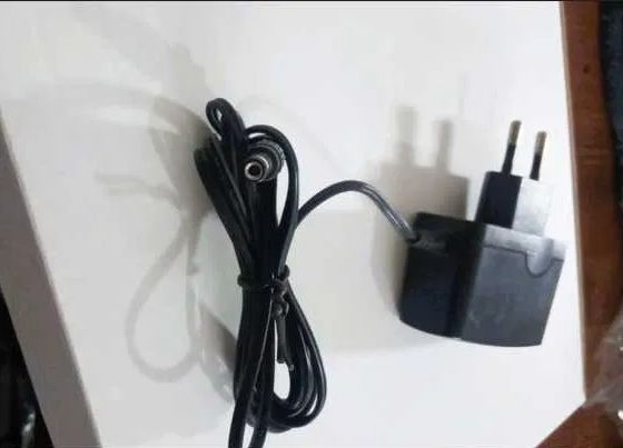 . 9v 0.6A 0.85A Блок питания зарядка на модем