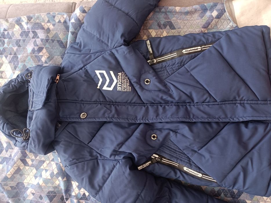 Продам зимний пуховик