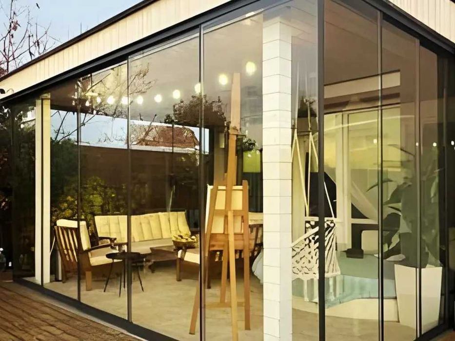 Închideri terase cu sticlă culisantă