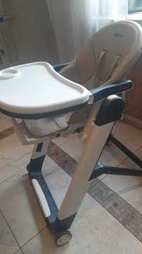 Детский стульчик для кормления . произв италия .имеет 3 полож