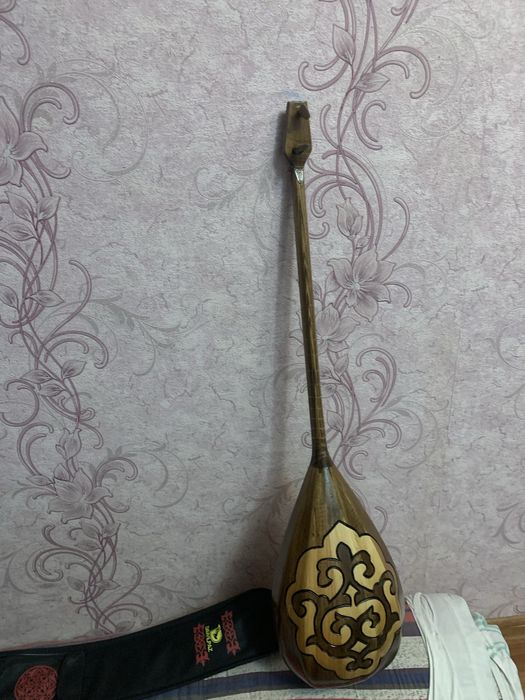 домбыра в новом состояний