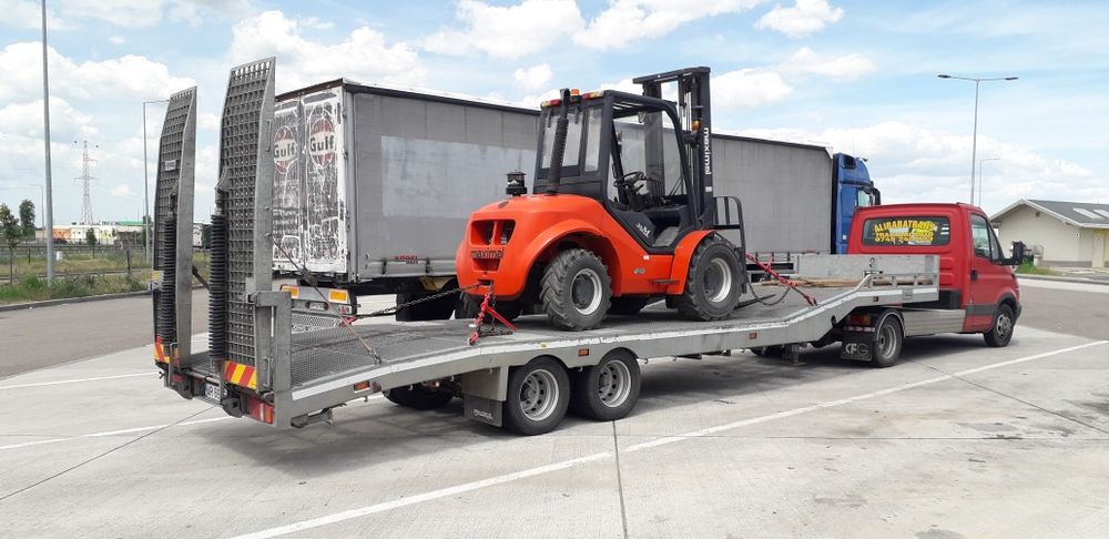 Transport utilaje . Tractări auto