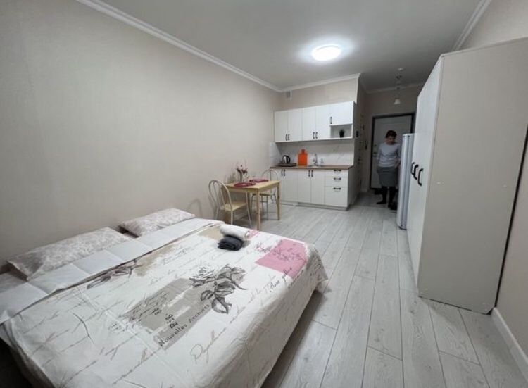 По часам квартира в центре 8 мкр. 11-12 мкр. Батыс 2