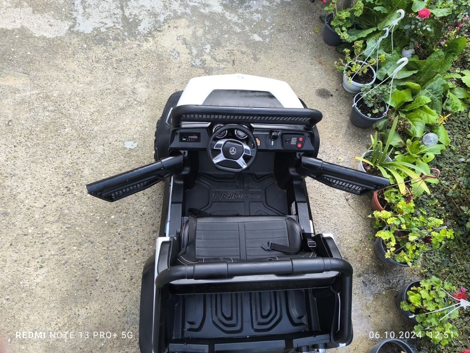 Mașinuță electrică.