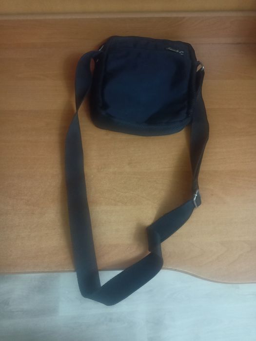 Барсетка не ношеная