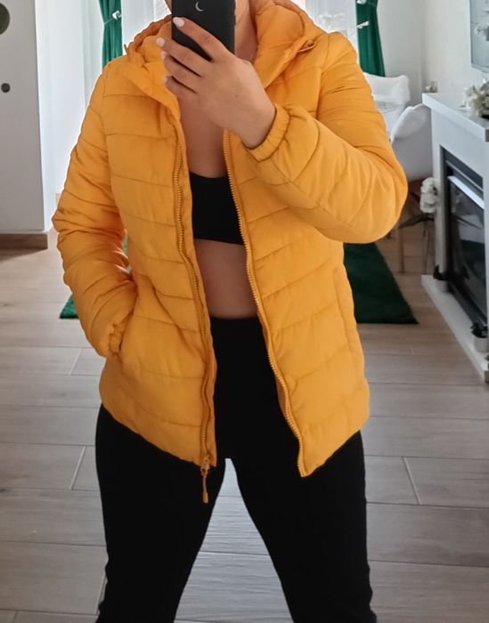 Geacă aproape nouă