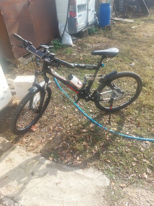 Vând bicicleta full suspensie