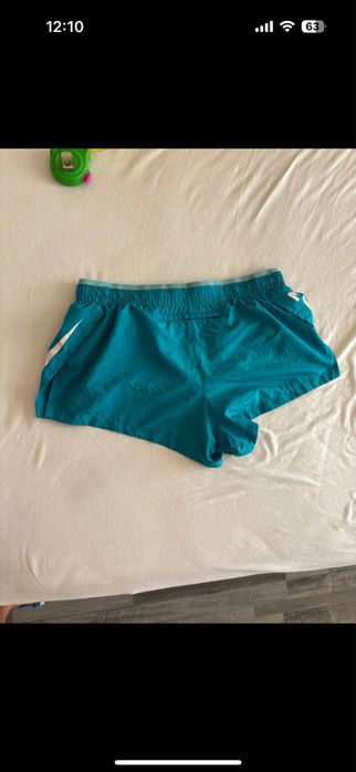 Pantaloni scurti de fete Nike running  dri-fit cu buzunar in spate