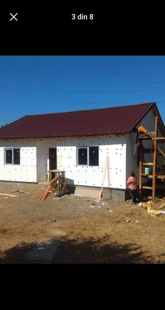 Casa modulara pe structură metalică rezistentă și invelita cu panou sa