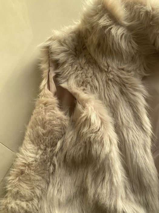 Vesta Berscha,purtata de cateva ori de culoare roz pudra