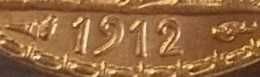 Moneda aur 20 franci francezi 1912, gradata NGC MS 64.