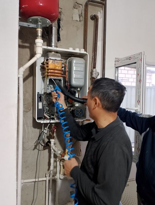 Ремонт газовых котлов. Установка Газовый котел жондеу