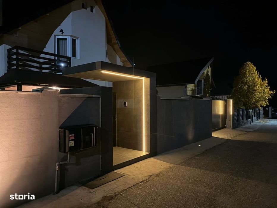 Casa moderna complet renovata, cu curte amenajata si sisteme inteligen