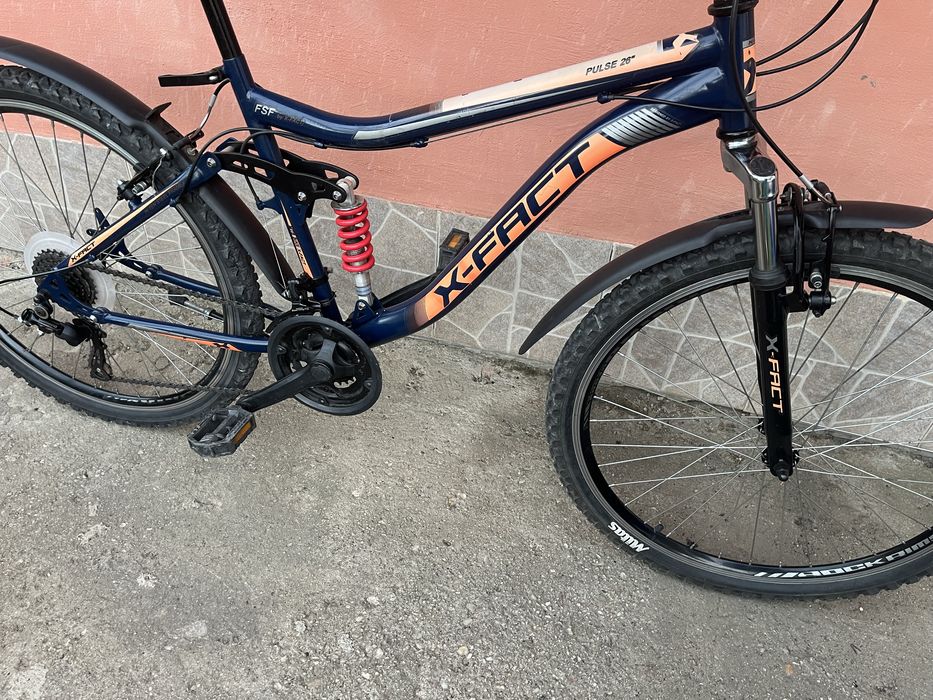 Bicicleta in stare foarte buna amortizor pe fata spate