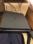 PlayStation 4 Slim – 1TB + GTA V + Căști + Controller – 599 lei