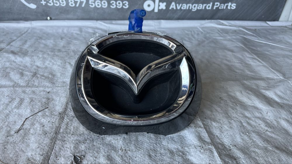 Емблема Mazda CX5