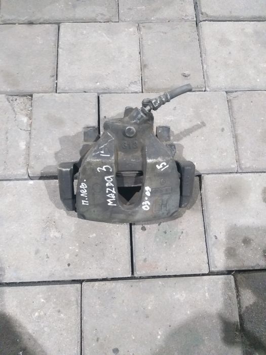 Суппорт передний Mazda3. 03-09 б/у оригинал
