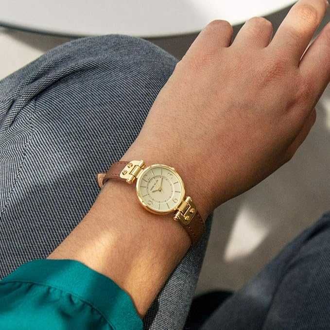Anne Klein shampan rangli siferblat bilan nafis ayollar soati