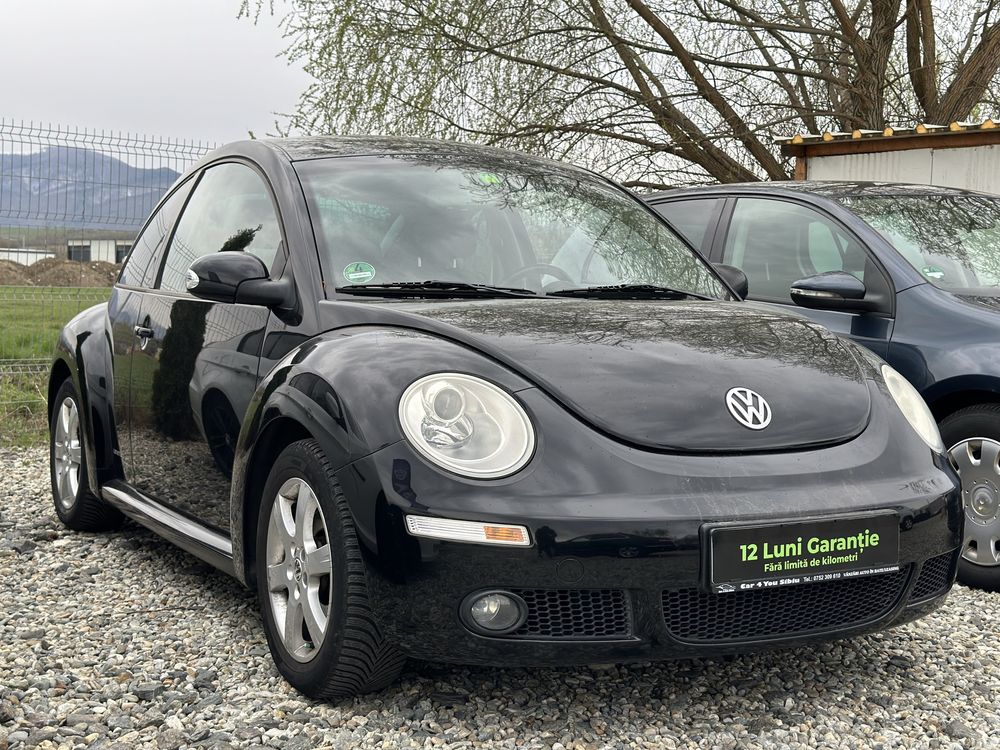 Vw new beetle 1.6i 2008 12 luni Garantie Rate