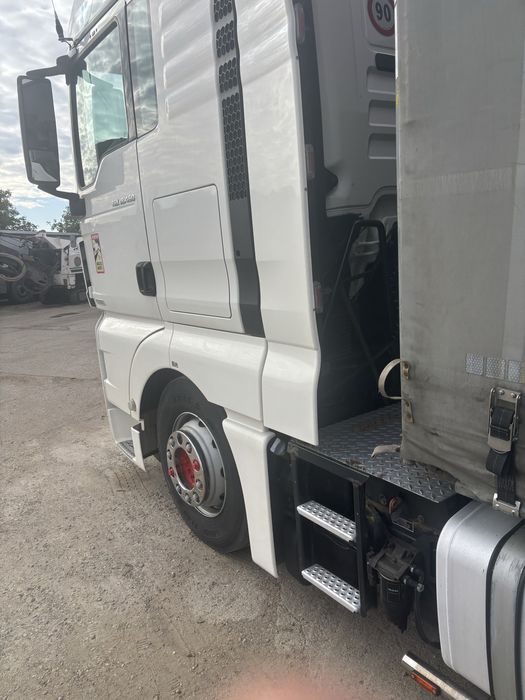 Man TGX 460-semiremorca Fliegel