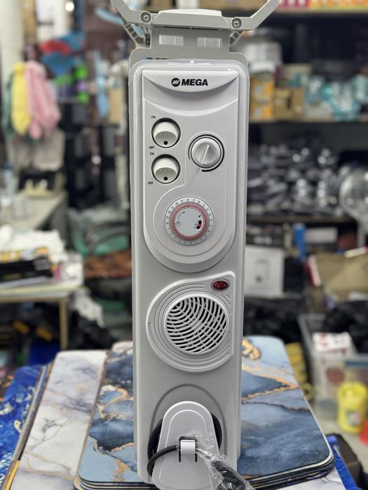 Maslinniy pechka , масляный обогреватель , abogrevatel maslenniy .