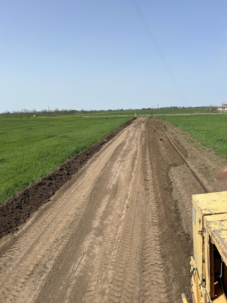 Inchiriez autogreder execut drumuri forestiere pietruite si cilindrat