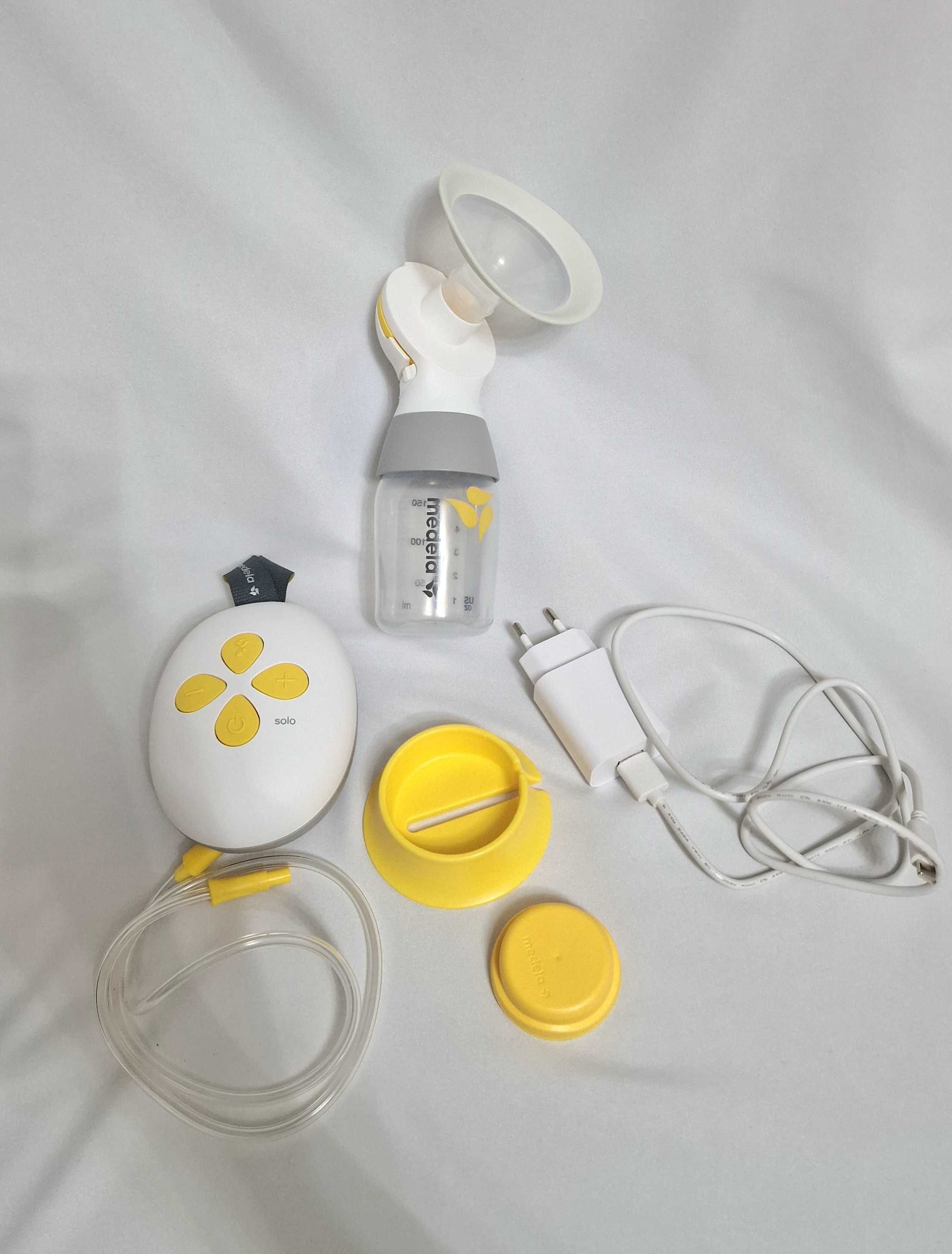 Medela -  двуфазна електрическа помпа за кърма