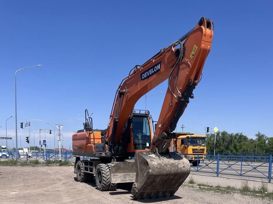 Услуги экскаватора 1.3 куб, колесный