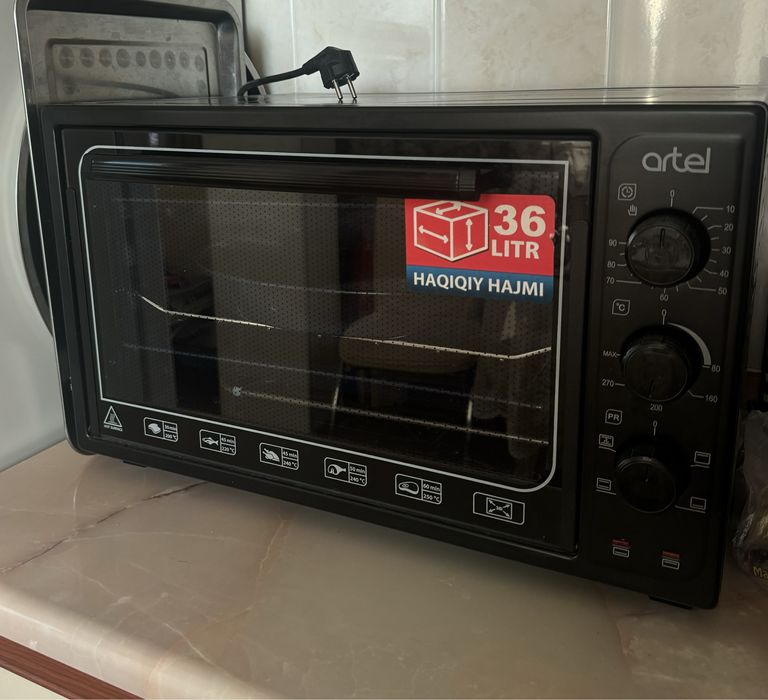Продам духовку Artel новая