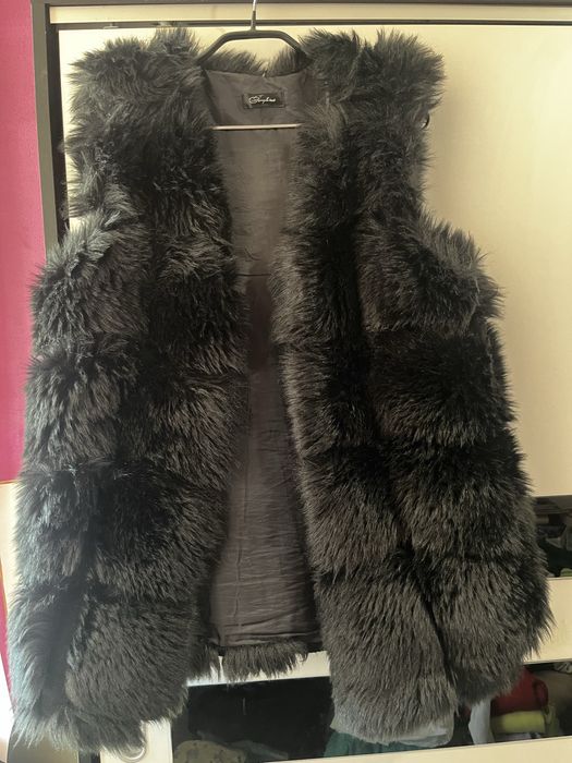 Дамски пухен елек