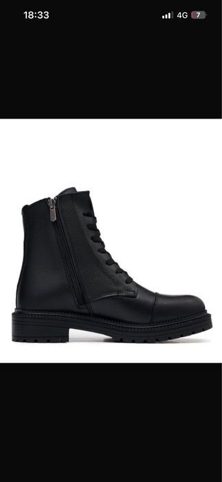 Продам женские Кожанные сапоги.  Новые, на замке