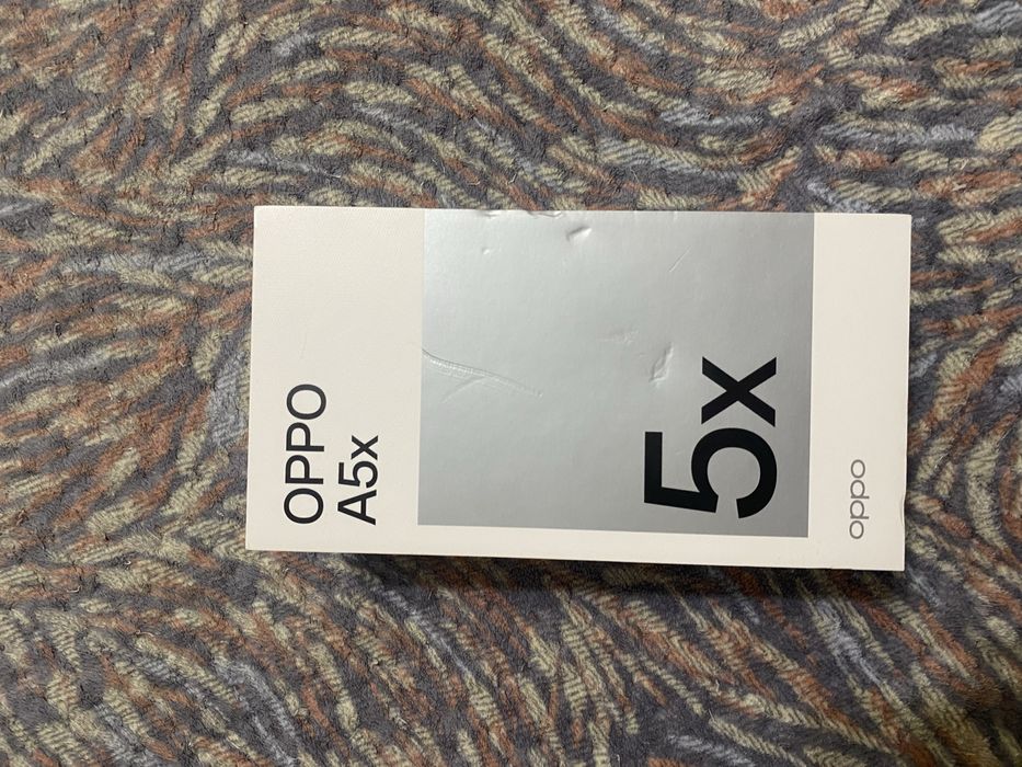 Oppo A5x новый + наушники