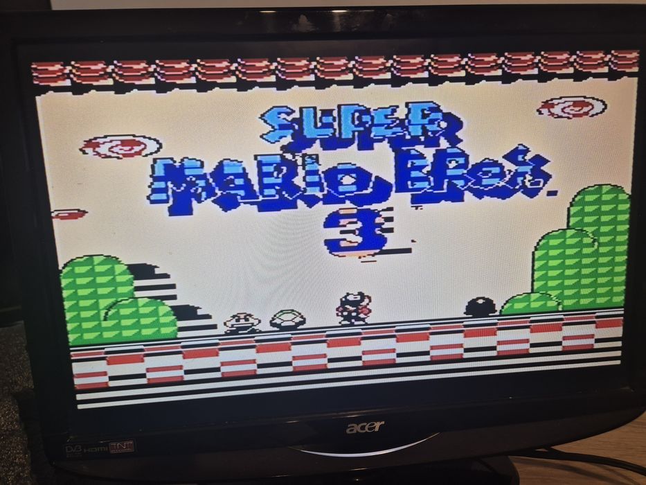 Nintendo NES plus 4 manete originale plus 2 jocuri