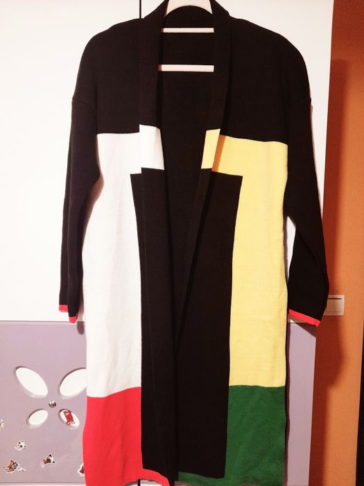 Нова,дълга жилетка