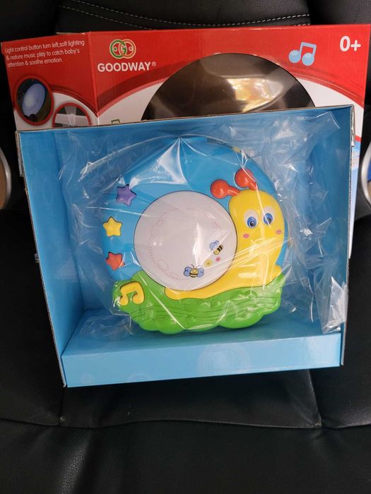 Proiector pentru bebelusi/copii melc cu muzica, lumini si sunete