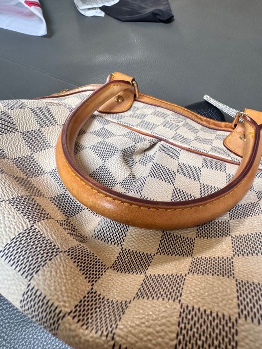Louis Vuitton Couissin PM bag