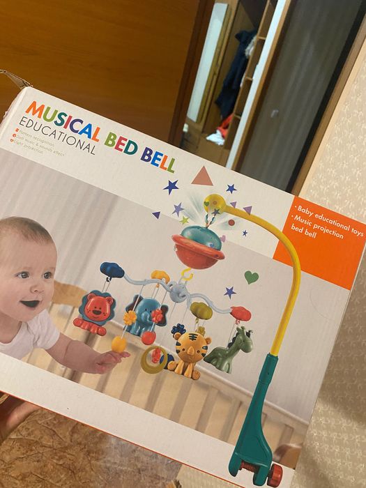 Музыкальная карусель на кроватку