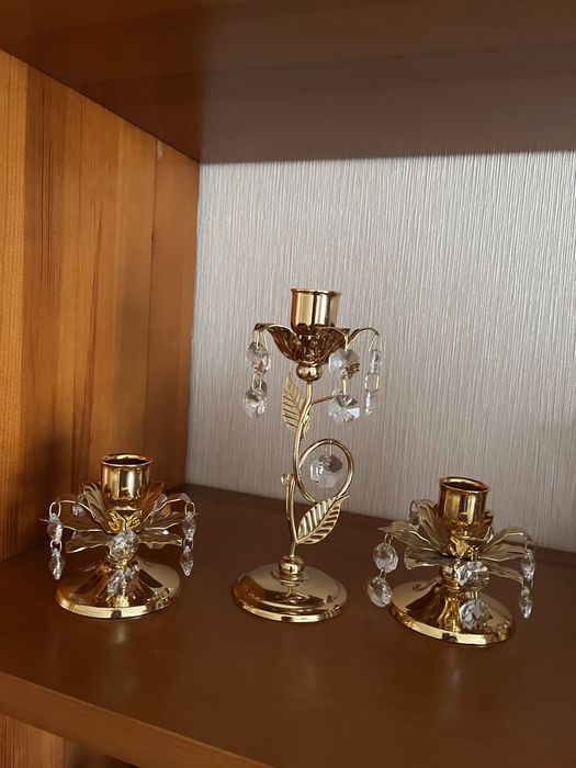 Продам три подсвечника  , состояние новых .