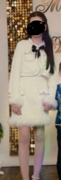 Твидовый кростюм