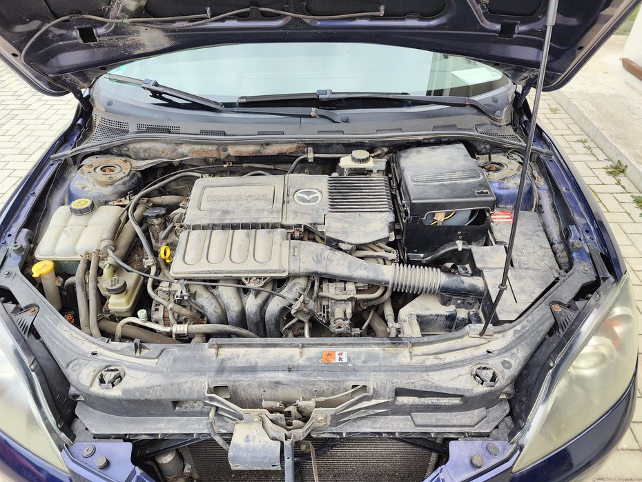 Mazda 3 1.6 benzina 2005 folie geamuri doua seturi de anvelope