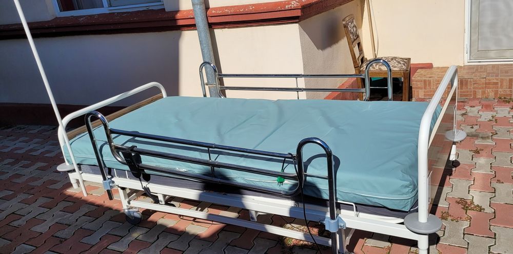 Pat electric cu telecomanda pentru persoane cu dizabilități .